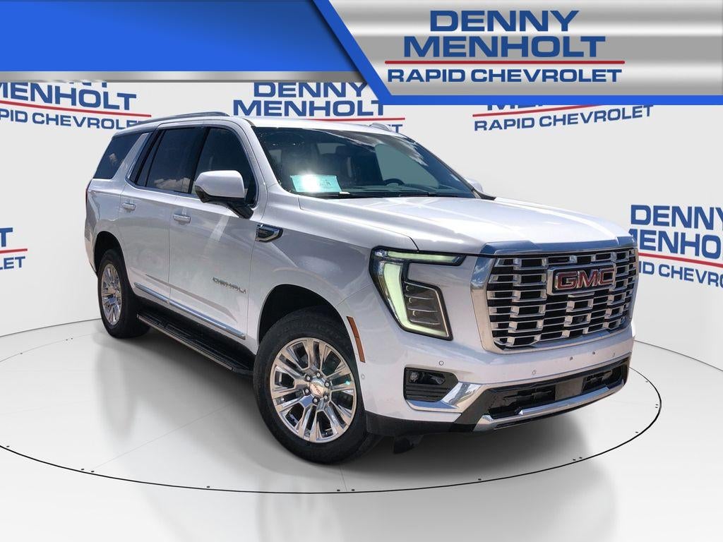 2025 GMC Yukon Denali in Summit White — front three-quarter view