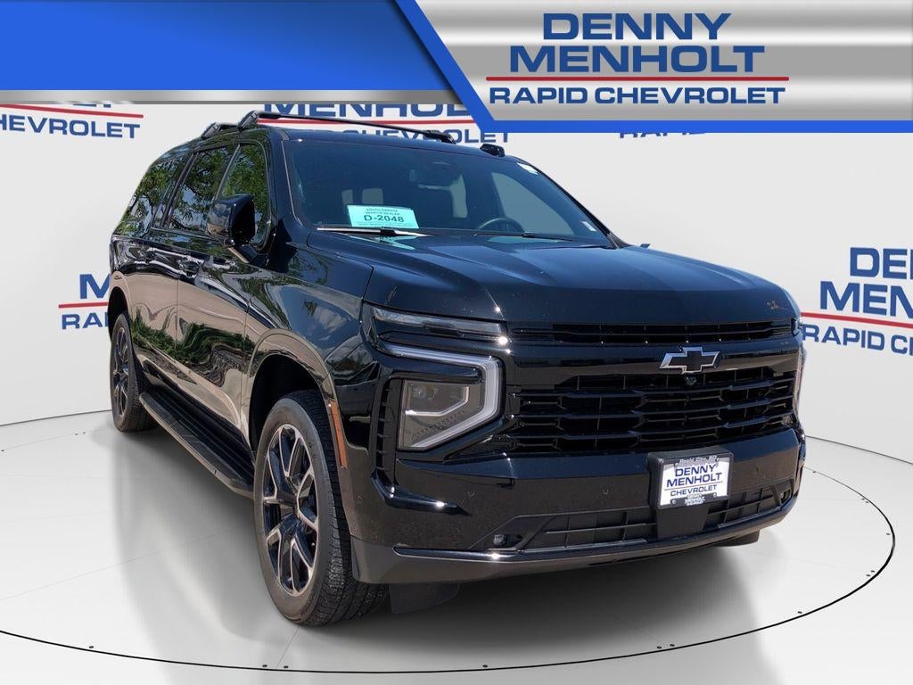 2025 Chevrolet Suburban RST in Black — front three-quarter view