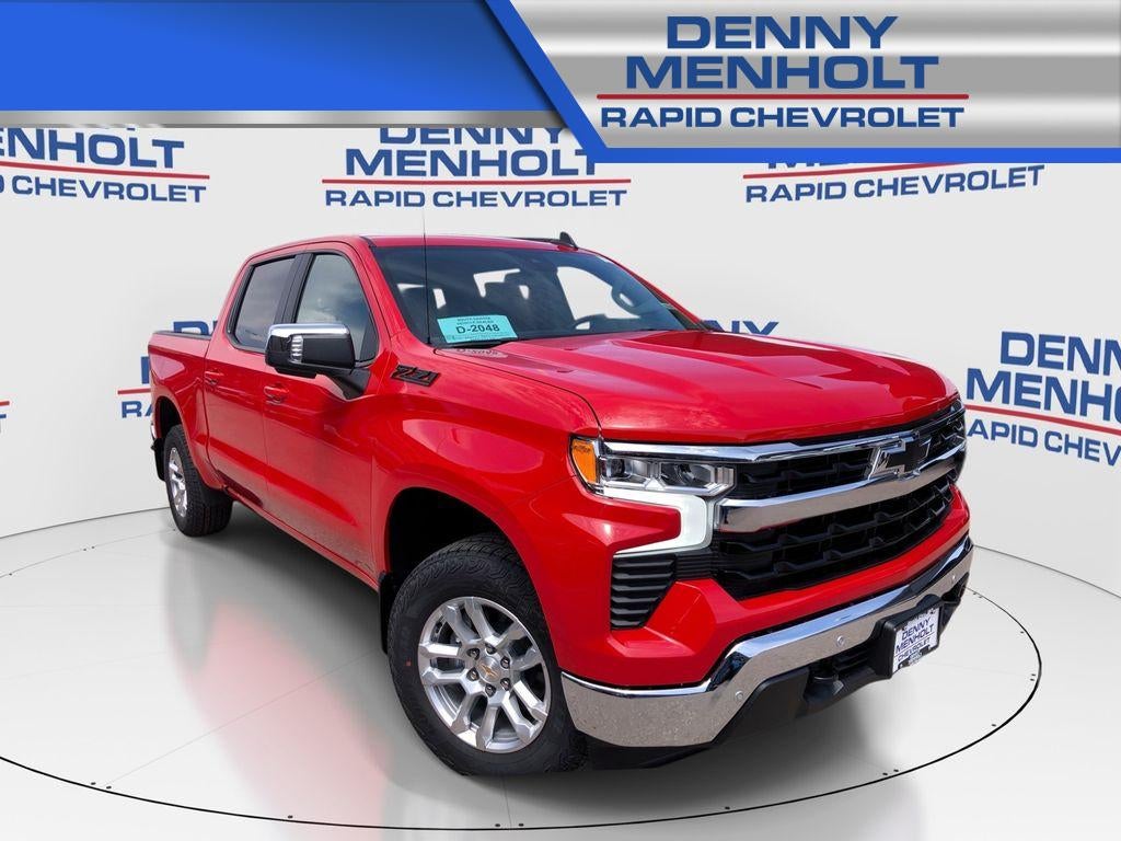 2026 Chevrolet Silverado 1500 LT in Red Hot — front three-quarter view
