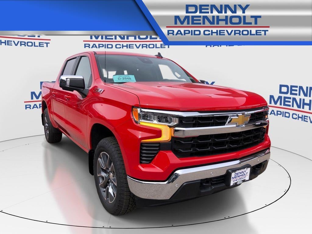 2026 Chevrolet Silverado 1500 LT in Red Hot — front three-quarter view