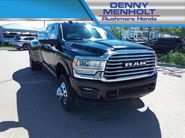 2024 RAM 3500 Longhorn 4x4 Crew Cab 8' Box in Diamond Black Crystal Pearlcoat — front three-quarter view