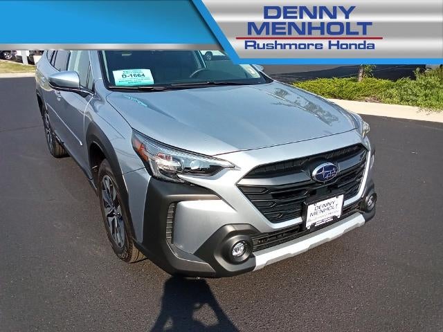 2025 Subaru Outback Touring AWD in Ice Silver Metallic — front three-quarter view