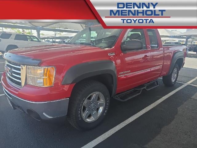 2013 GMC Sierra 1500 Extended Cab Standard Box 4-Wheel Drive SLT in Fire Red — front three-quarter view