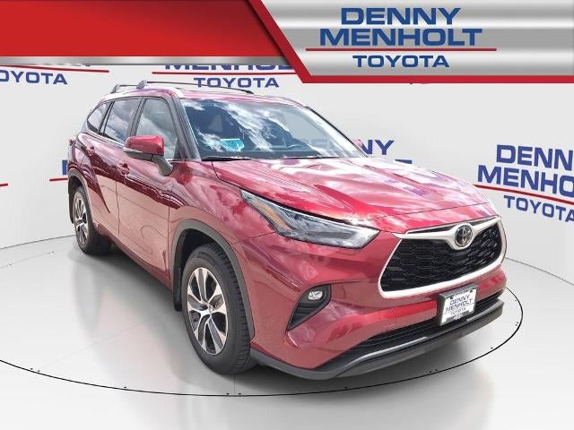 2023 Toyota Highlander XLE AWD (Natl) in Ruby Flare Pearl — front three-quarter view