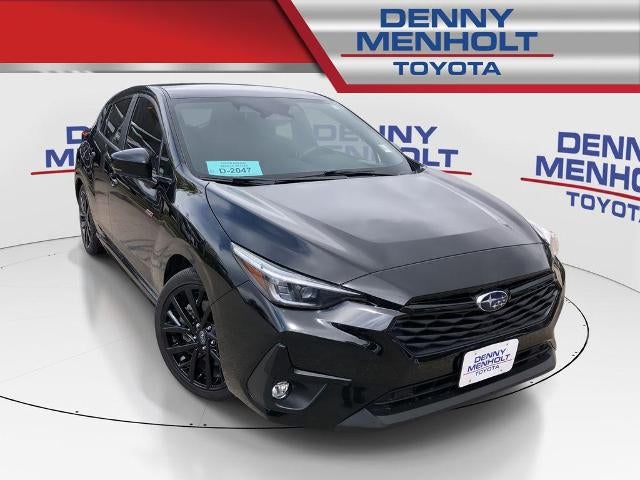2024 Subaru Impreza RS AWD in Crystal Black Silica — front three-quarter view